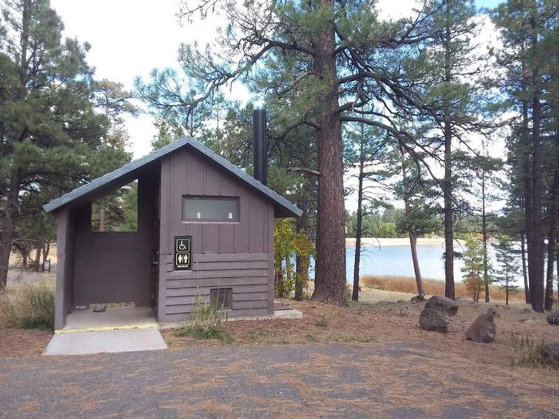 one of many vault toilets at campground