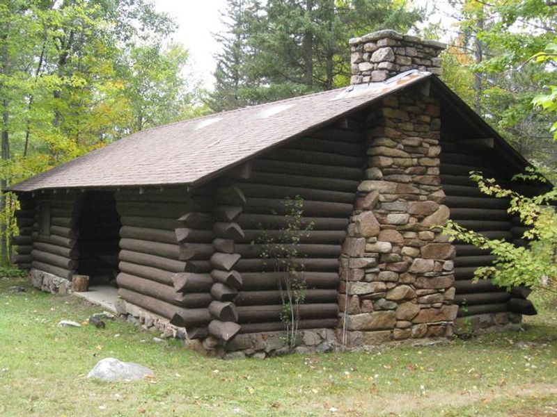 Fenske Lake CCC era picnic pavilion. Pavilion is available for day-use on a first come basis.  Pavilion contains picnic tables and fireplace.