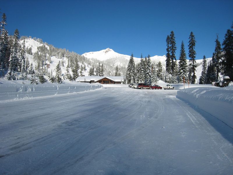 The parking area is typically plowed in winter; overnight stays are allowed year-round.