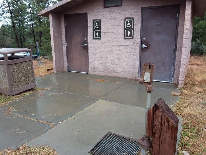 Thumb Butte Group Campsite Restrooms with a water spigot and trash can