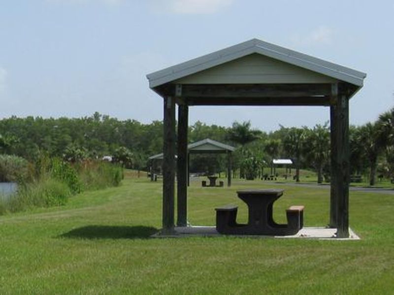 Day use area around the lake at Midway Campground
