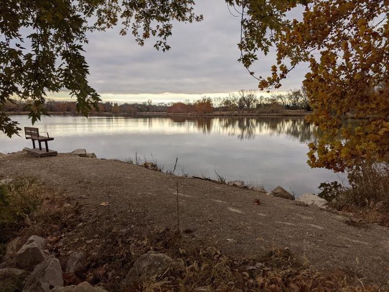 Bench overlooking the gathering pond at Outlet Park
