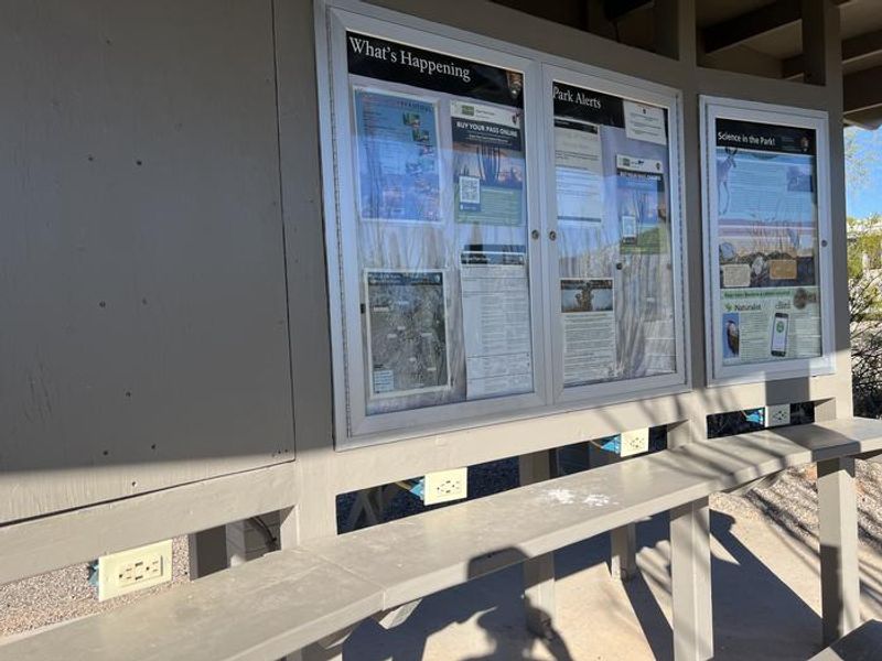The shade ramada near the entrance kiosk features wall receptacles for visitors to recharge phones and other electronic devices.