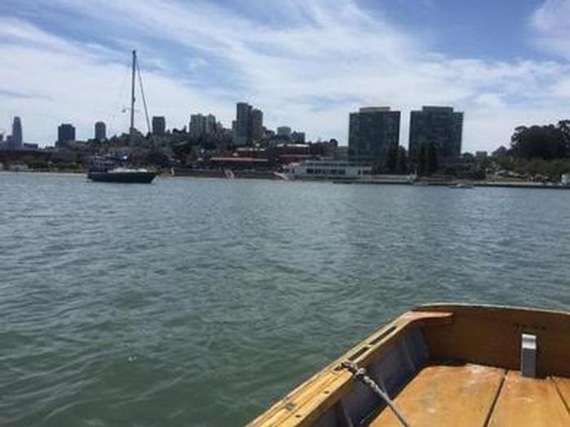The view looking south from within Aquatic Park Anchorage.  A visiting sloop and the Maritime Museum on the far shore.