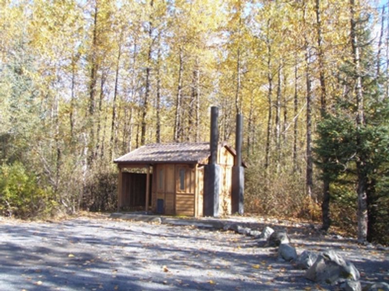 There is a ADA accessible vault toilet in the campground parking lot.