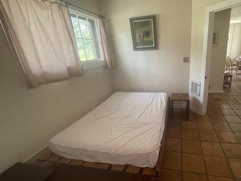 1st Bedroom of Portal CCC House, including full bed.