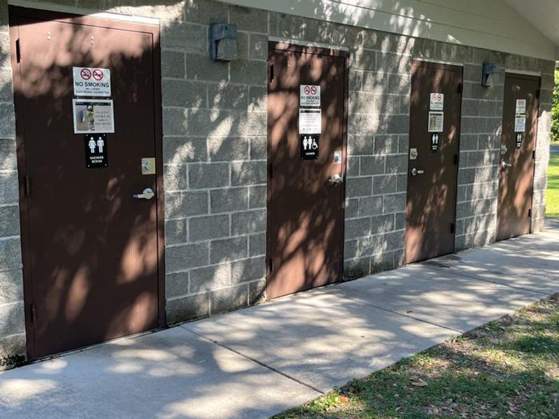 Showers on the the backside of bathrooms