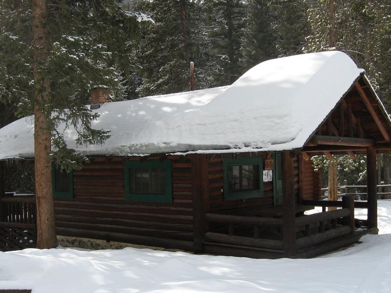 Mill Creek Cabin covered in snow
