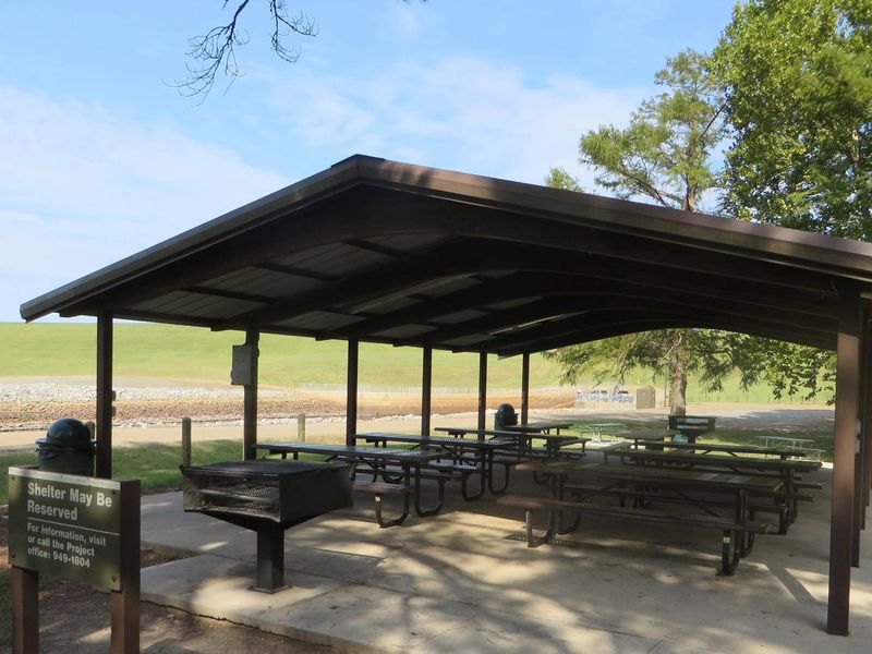 This picnic shelter is available in the Tom Merrill Recreation Area.  Pavilion fee is $50 a day and shelter reservations may be made by calling (318) 949-1804, or by reserving on recreation.gov. Pavilion can hold a maximum capacity of 75 people. Located within walking distance of the comfort stations and the outlet channel. 