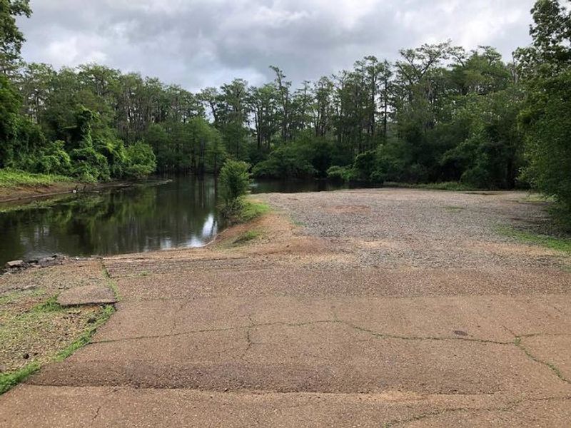 Hardened boat ramp with excess parking available. 