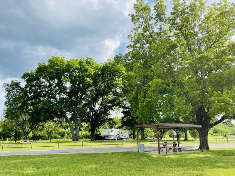 A photo of facility Damsite Texas with Picnic Table, Electricity Hookup, Fire Pit, Shade, Water Hookup