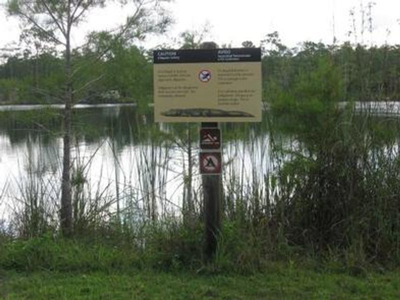 Wildlife signage around the lake.
