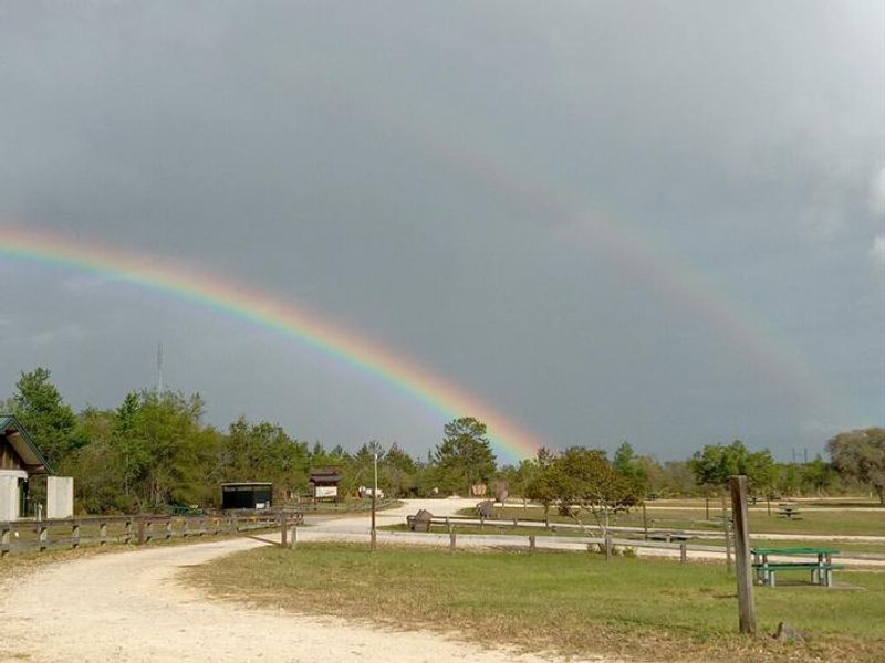 Rainbow over the bathhouse and entrance to Big Scrub.