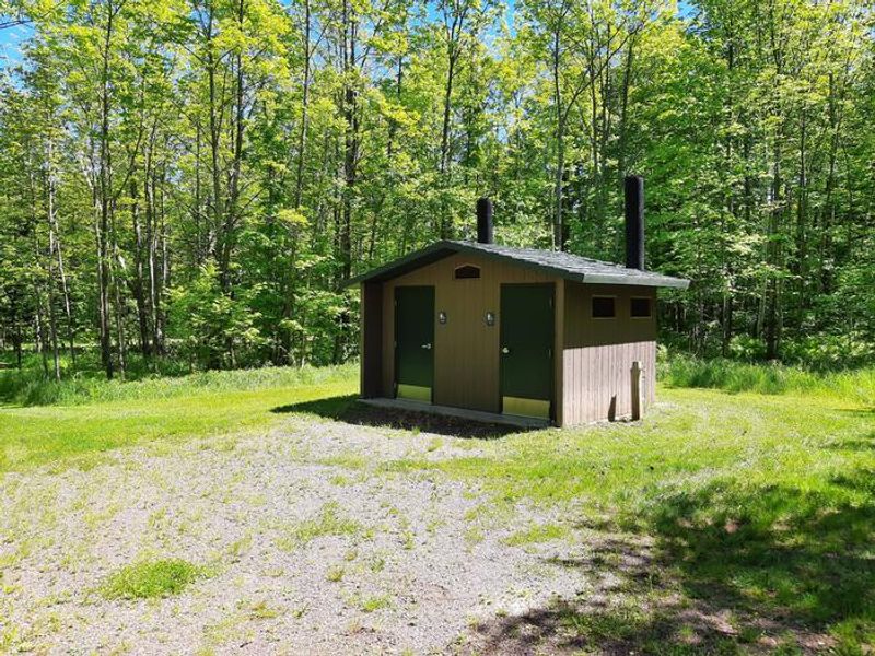 Vault toilet in Black River Harbor Campground.