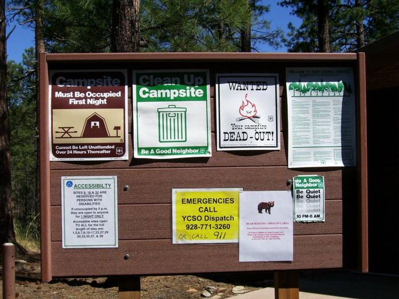 Bulletin board with camp site information and rules. 