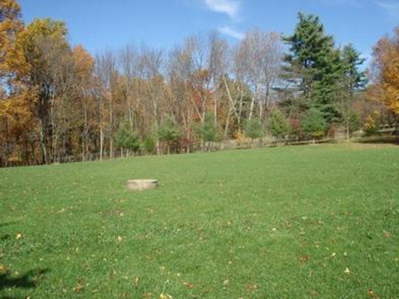 The large grass athletic field located behind the dining hall is great for a variety of activities!