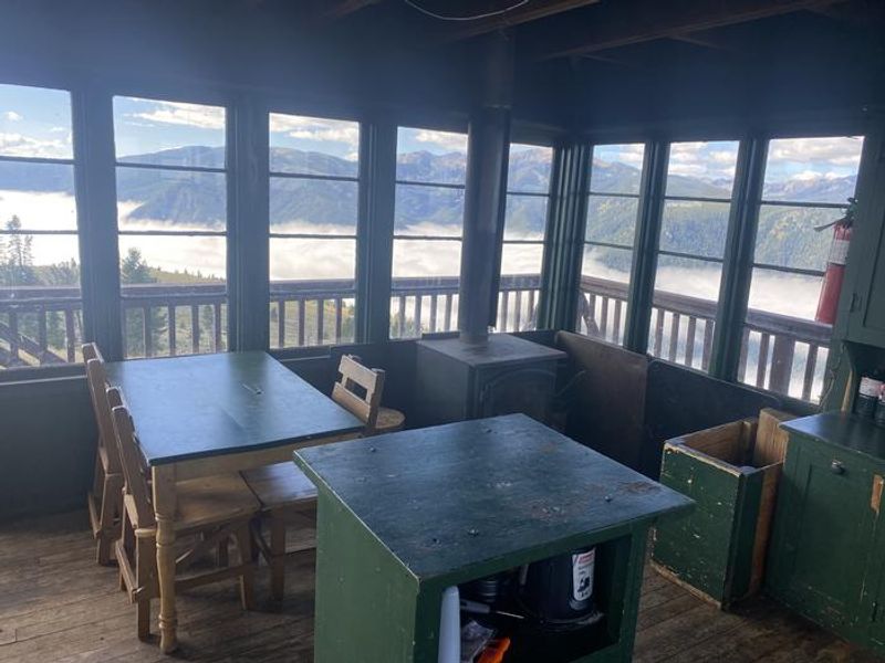  Looking SW inside lookout.  Table and woodstove.