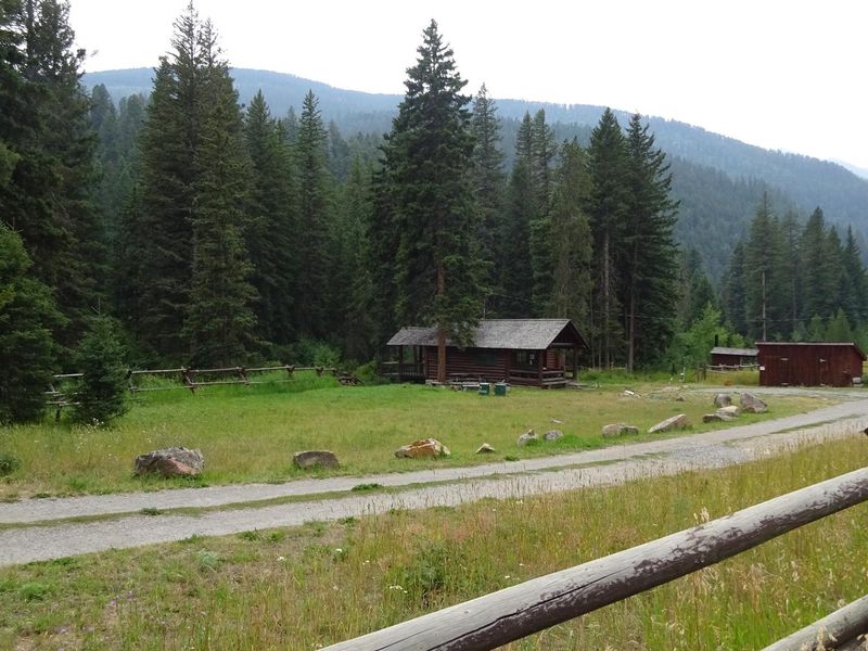Mill Creek Cabin at the edge of the meadow