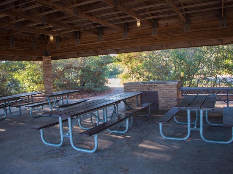 The youth campground features a large picnic pavilion, perfect for gathering the whole group beneath for meals or activities.