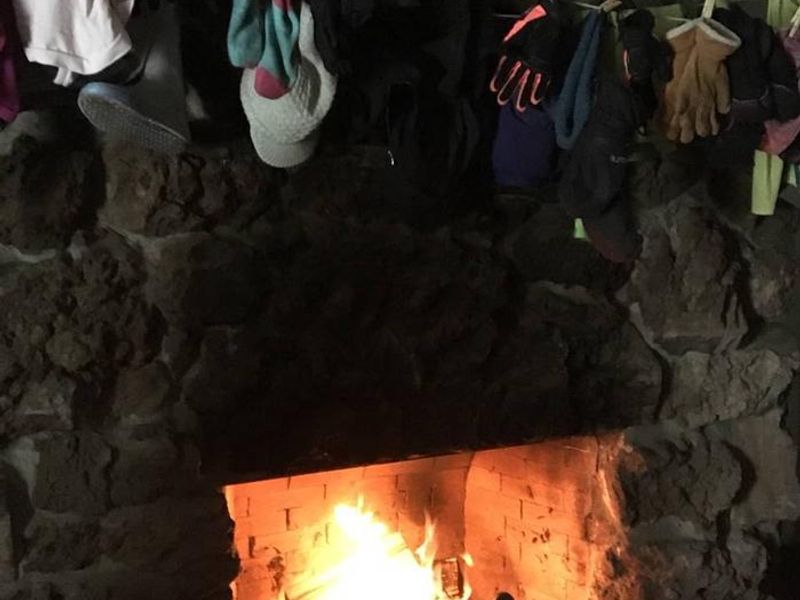 Wood burning stone fireplace