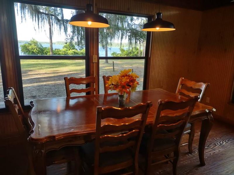 Seating for 6 at this table, plus four more at the breakfast bar. 