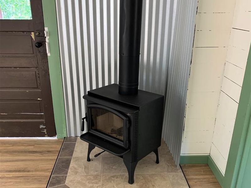 Wood stove installed 2022 inside the guard station