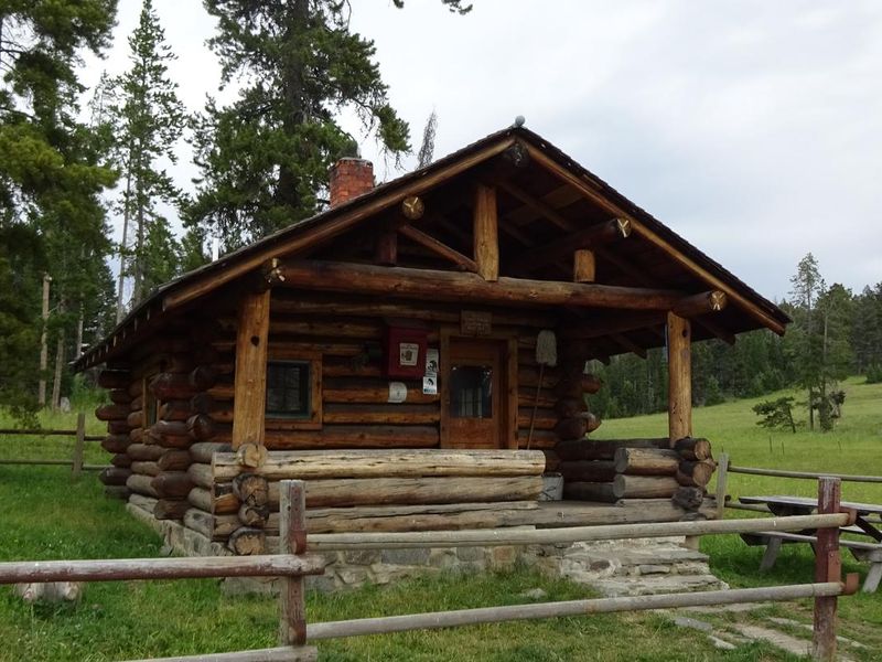 Ibex Cabin sits on the edge of a meadow