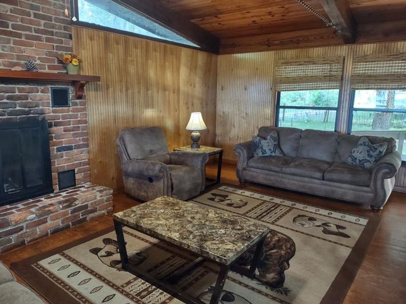 Lounge in the cabin, picture fireplace is non-functional