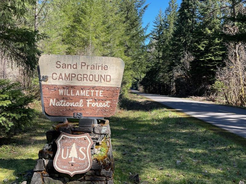 The entrance sign for Sand Prairie Campground can be seen easily from Forest Service Road 21 and guides you into the campground.