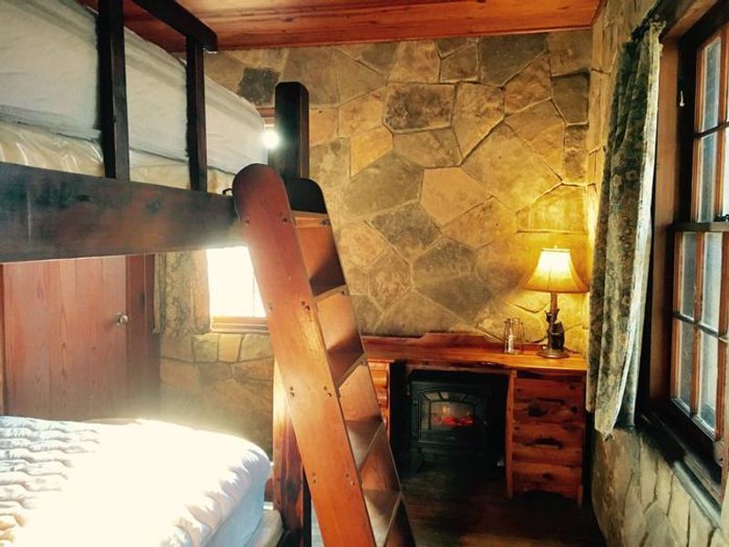 Cabin A's front bedroom with a full sized bunk bed.