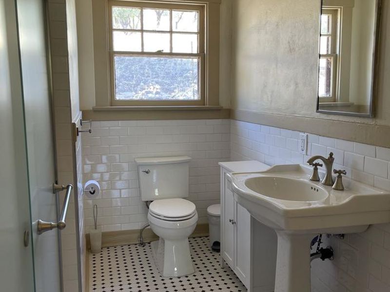 Bathroom with sink, toilet and shower
