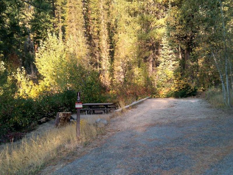 The driveway for Site 13 is above a short set of stairs.