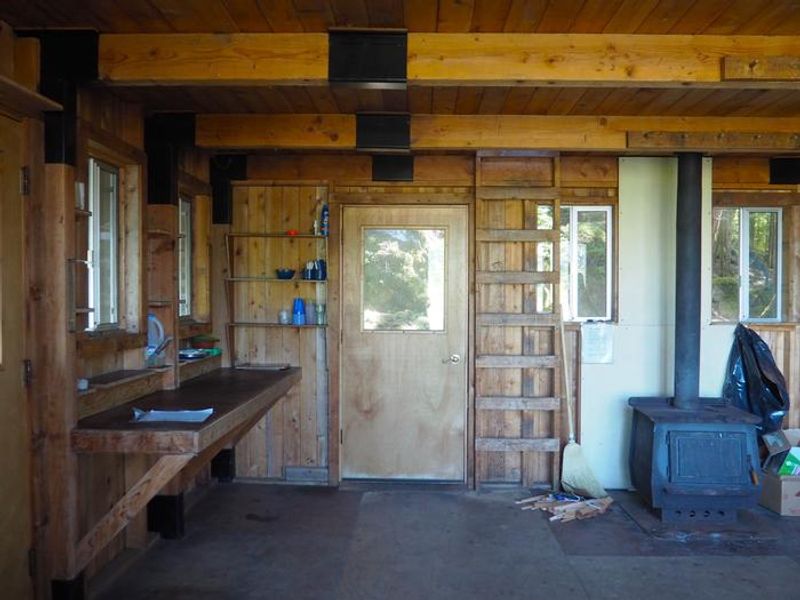Interior of Steamer Bay Cabin with wood stove