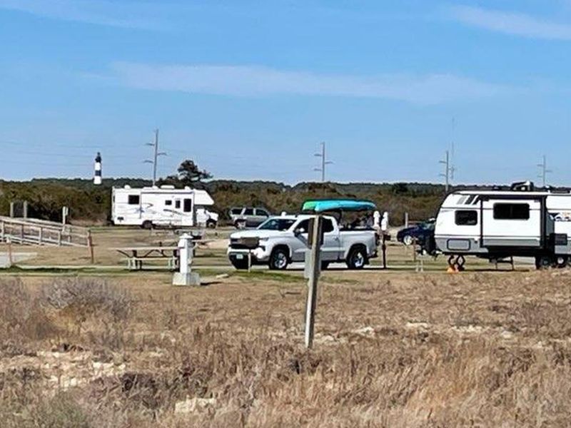Oregon Inlet Campground with a view of the Bodie Island Lighthouse