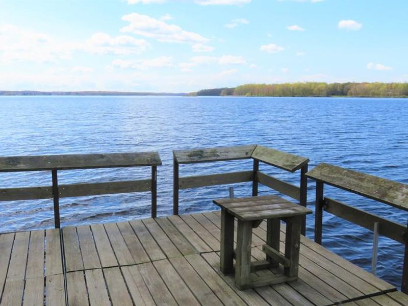 Accessible fishing pier and view of lake