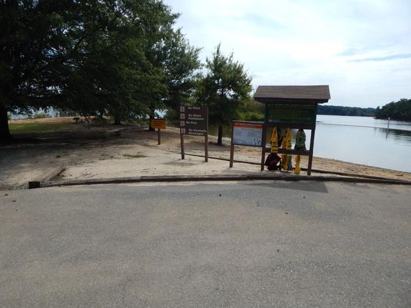 This is a photo of the life jacket loaner station at the designated swimming area at Ivy Hill. This life jacket loaner station allows life jackets of all sizes to be borrowed and returned.  