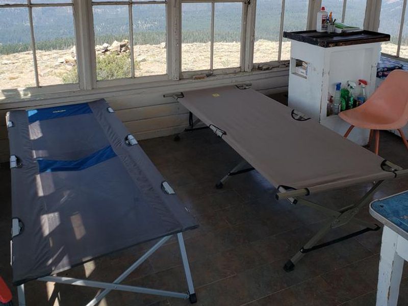 Interior of Cabin Showing Cots and Storage