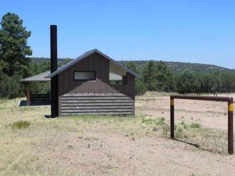 Hitching post, vault toilet at Timber Camp Equestrian