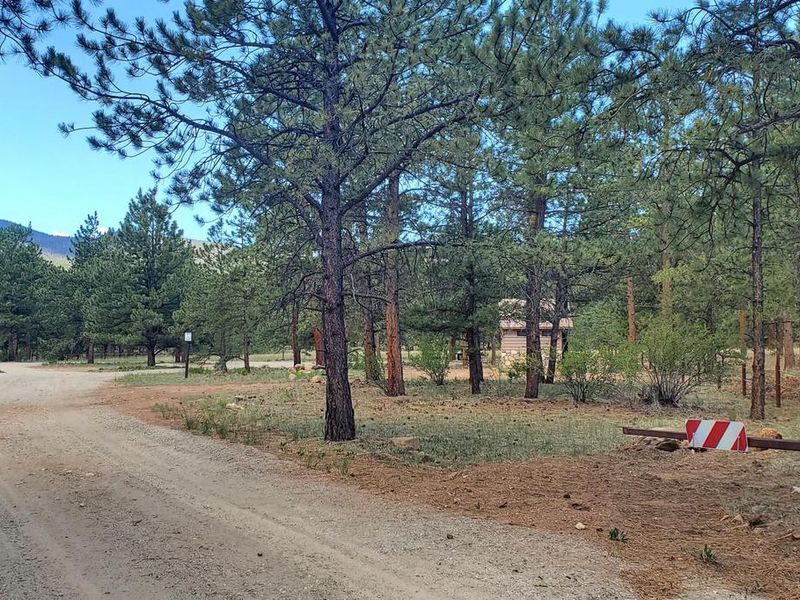 The gated entrance provides privacy and welcoming view.