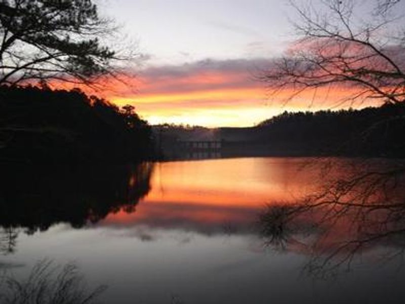 Sunrise looking toward the dam from the area of campsite #29.
