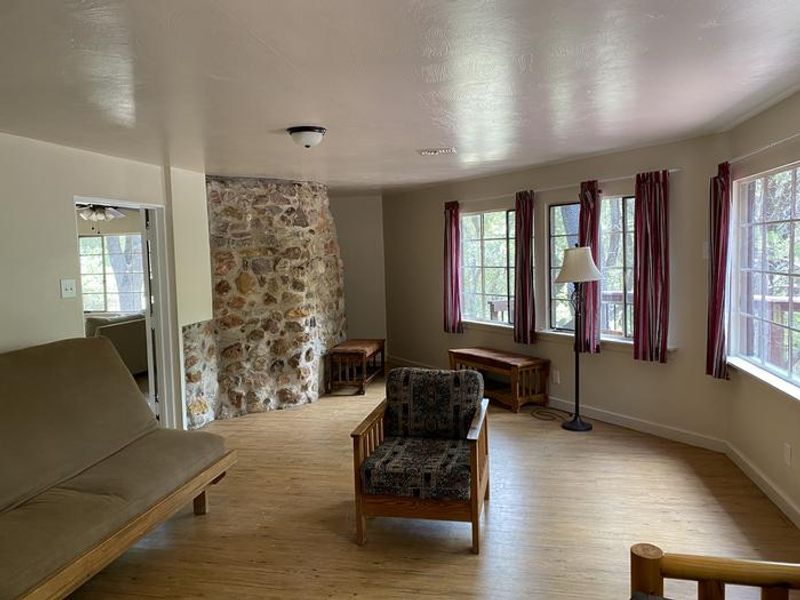 The large back room looks out on the deck and has two futons.