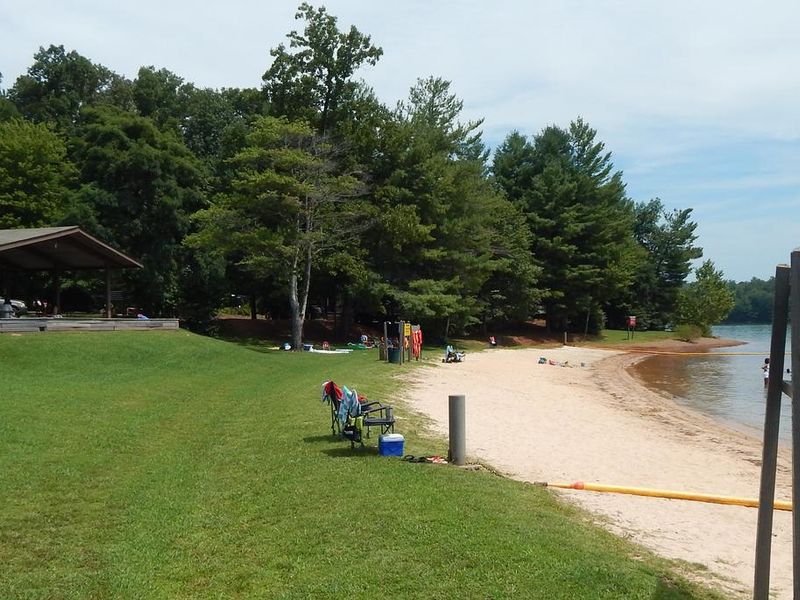 Sandy beach and swim area at Goose Point. 