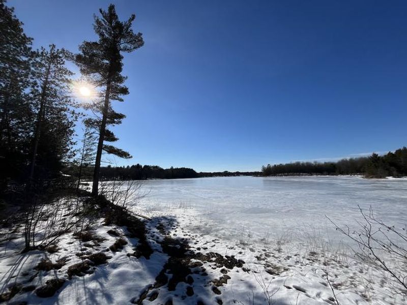 An icy view of the Mack Lake shoreline