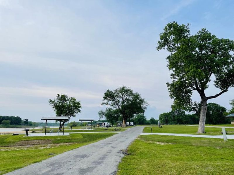 A photo of facility BURNS RUN EAST with Picnic Table, Electricity Hookup, Fire Pit, Waterfront, Water Hookup
