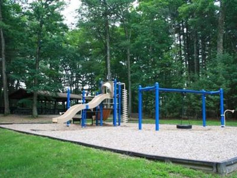 Shelter #1, near playground, beaches, restrooms, sand volleyball court and parking.  Wheelchair accessible.