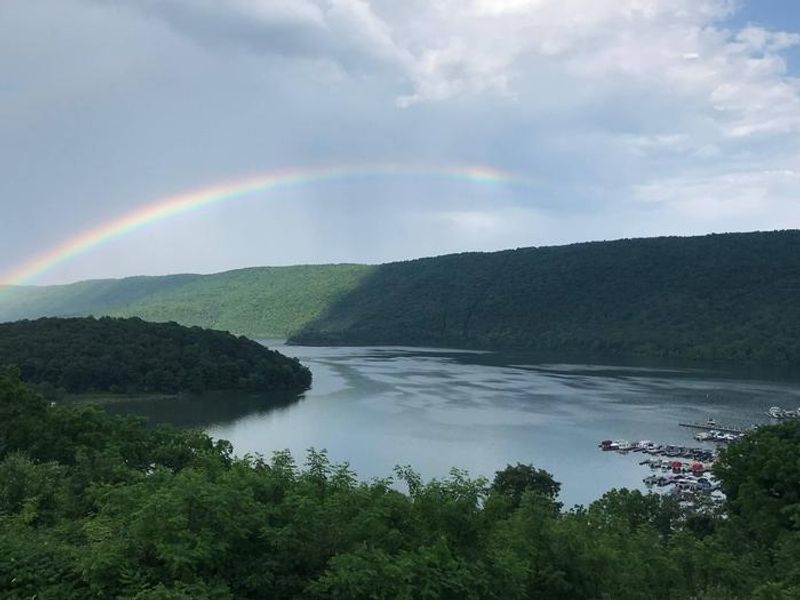 View of a rainbow over Seven Points Marina 