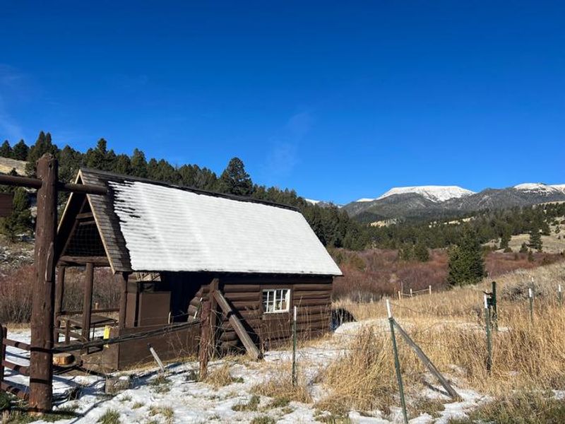 Hells Canyon Guard Station with water pump in the background