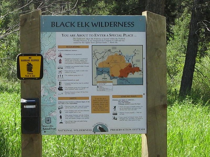 Willow Creek trailhead bulletin board in trailhead parking area
