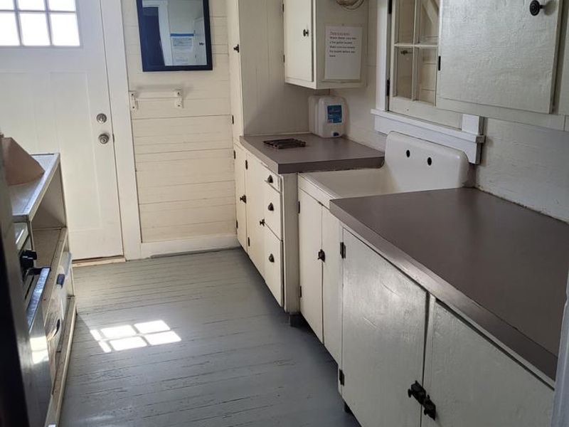 This photo was taken from the living area looking into the kitchen.