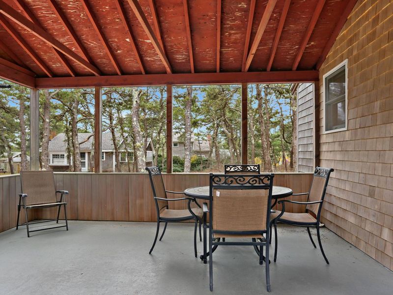 A screened porch is always a popular place for relaxing in the morning air